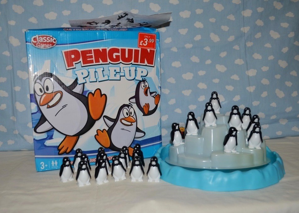 Игра пингвин. Игра пингвины на льдинах. Игра пингвины на айсберге. Penguin pile up настольная игра. Настольная игра пингвины на льдине.