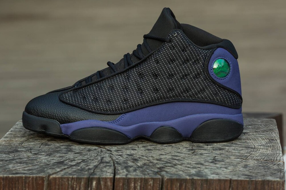 Jordan retro best sale black and purple